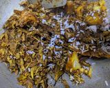 A picture of step 6 of Mocha(banana flower) narikel (coconut) chochori.
