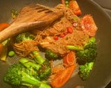 A picture of step 8 of Stir fried noodle with cheesy Tamagoyaki and grilled soysauce avocado.