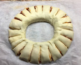 Foto del paso 6 de la receta: Rosca de Hojaldre Salada con un toque picante