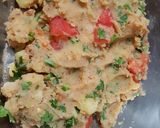A picture of step 4 of Aloo ka bharta.