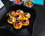 A picture of step 4 of Jain Nachos with Salsa and cream cheese.