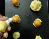 A picture of step 4 of Surprise Churros.