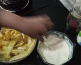 A picture of step 5 of Crispy honey chilli potato.