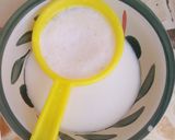 A picture of step 5 of Millet kunu with white rice,fresh groundnut and wheat.