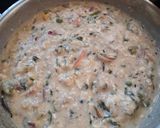A picture of step 4 of Cheesy Mix veggies in white sauce.