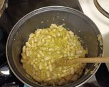 Foto del paso 3 de la receta: Quinoa con alubias blancas, brócoli y alcachofas