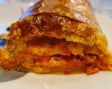 A picture of step 5 of Puff Pastry Roll Filled with Marinated Pork Loin and Cheese.