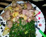A picture of step 10 of Fried nduma with beef and potato served. with spinach.