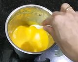 A picture of step 3 of Mango milkshake shots with chocolate syrup.