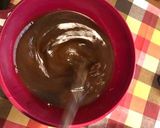 A picture of step 4 of Christmas cookies dipped in honey, aka melomakarona.