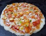 A picture of step 6 of Rava pan pizza.