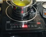 A picture of step 2 of Narkel diye Bhaja Muger Dal: Bengali Style- Yellow Moong Dal with Coconut (Without Onion-Garlic).