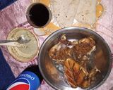 A picture of step 6 of Achari chicken broast.