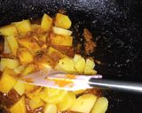 A picture of step 15 of Khatay aloo.
