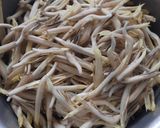 A picture of step 1 of Banana flowers dip in mustard seeds.