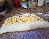 Foto del paso 7 de la receta: Rosca de cebolla de verdeo y Queso 🧀 🧀 🧀 🧀