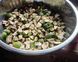 A picture of step 1 of Kache aam ka achar.