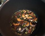 A picture of step 3 of Pan fried pork chop with soy sauce.