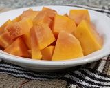 A picture of step 1 of Sweet Papaya -Orange Shots.