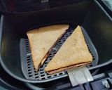 A picture of step 3 of Nutella and Banana sandwich made in Air fryer.