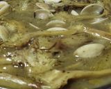 Foto del paso 6 de la receta Alcachofas con almejas en salsa verde