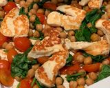A picture of step 6 of Halloumi with pesto, balsamic tomatoes, spinach and chickpeas.