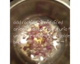 A picture of step 1 of Fried black beans (njahi).