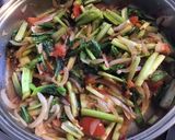 Une image de l'étape 8 de Choy sum sauté oignon ail et tomates.