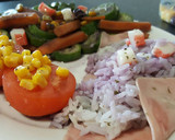 Foto del paso 3 de la receta: Arroz con pavo, calabacín, zanahoria y tomate con salsa de arandanos