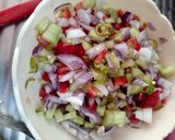A picture of step 5 of Kachoomar Salad.