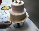 A picture of step 8 of Up in the clouds fondant Birthday cake.