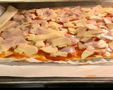 Foto del paso 4 de la receta: Pizza de masa de hojaldre hecha por Berta