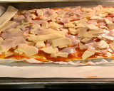 Foto del paso 4 de la receta: Pizza de masa de hojaldre hecha por Berta