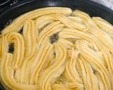 A picture of step 5 of Churros.