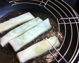 A picture of step 4 of Easy Pan-Fried Edamame Cheese Spring Rolls.