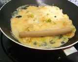 Foto langkah ke 4 dari resep Telur dadar isi sosis.