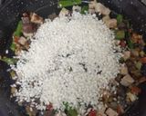 Foto del paso 2 de la receta: Arroz con butifarras banca y negra y verduras
