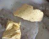 A picture of step 2 of Poached Cod with white sauce.