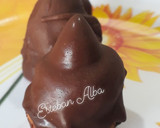 Foto del paso 5 de la receta: Conitos con dulce de leche bañado con chocolate