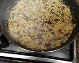 Foto del paso 5 de la receta: Paella de quinoa con setas, alcachofas y alubias tintas