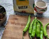 A picture of step 1 of Big green chillies pakoda. (mirchi bhajji).