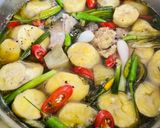 Hình bước làm 6 của món Cá Ồ Kho Chuối Cau