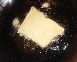 A picture of step 2 of Fried bread with egg.