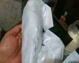 A picture of step 6 of Chocolate Coconut Swiss Roll.
