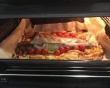 Foto del paso 2 de la receta Lubina al horno con tomates cherry, patatas y cebolla