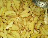 A picture of step 1 of Fries and egg with ketchup.