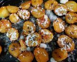 A picture of step 5 of Oven roasted chilli potato.....