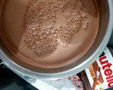 A picture of step 1 of Nutella milk shake.