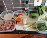 A picture of step 1 of Asian style pork kebabs, steamed veg and yellow rice.