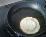 Foto del paso 6 de la receta Empanaditas redondas rellenas de carne picada